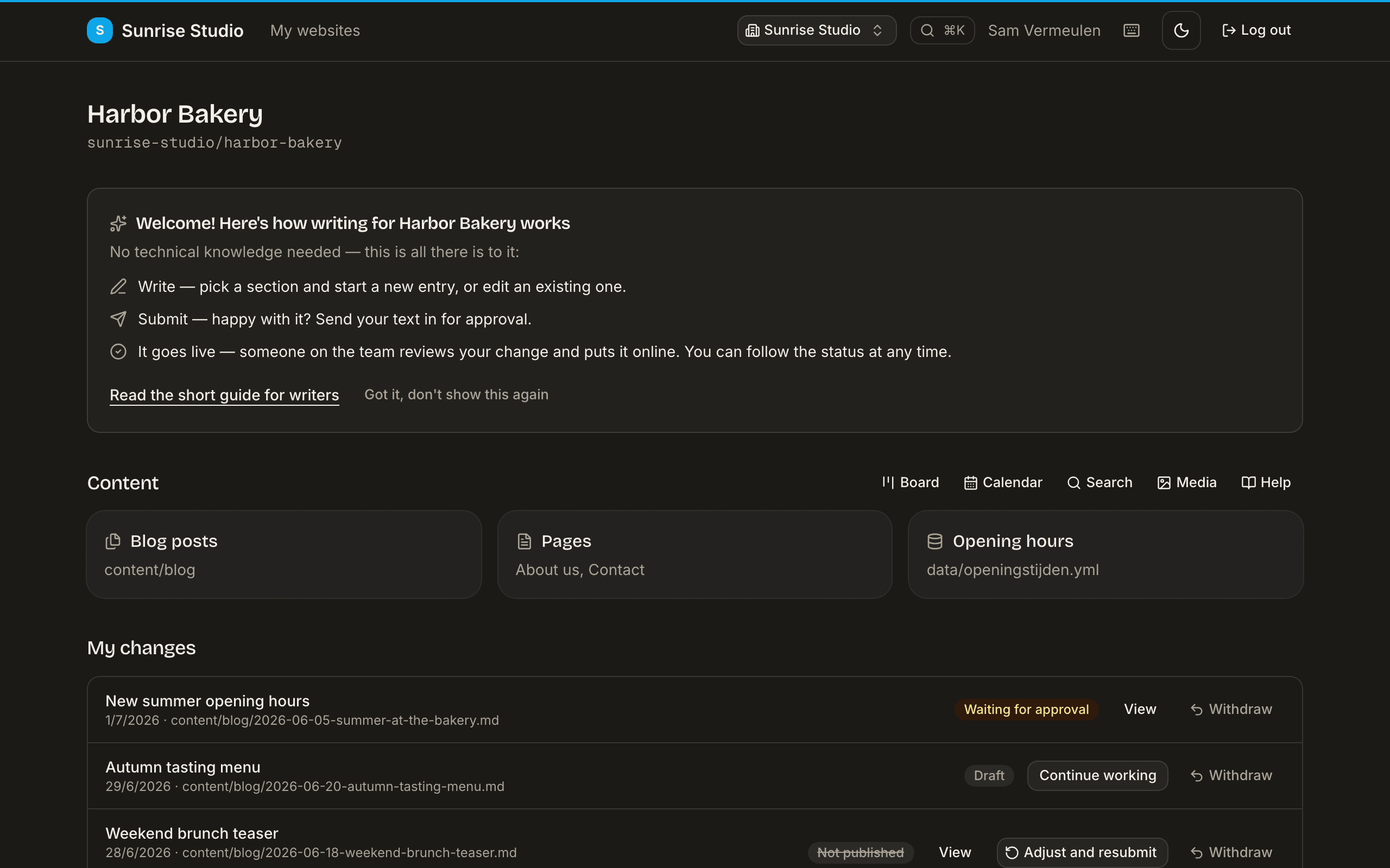 A site page with the panel “Welcome! Here's how writing for Harbor Bakery works”, listing the three steps write, submit, it goes live, above the site's collections and the writer's own changes with status badges